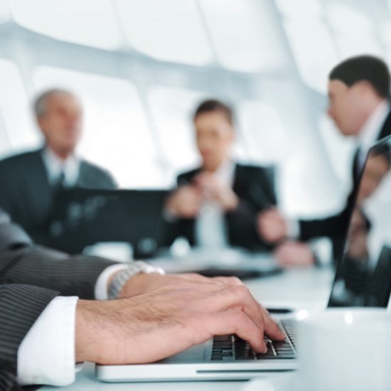 group of lawyers one using a computer